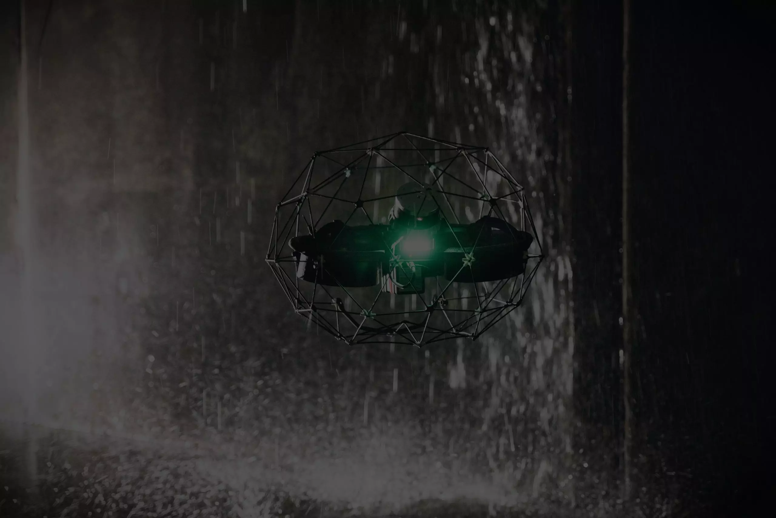 Elios 3 in front of a underground waterfall