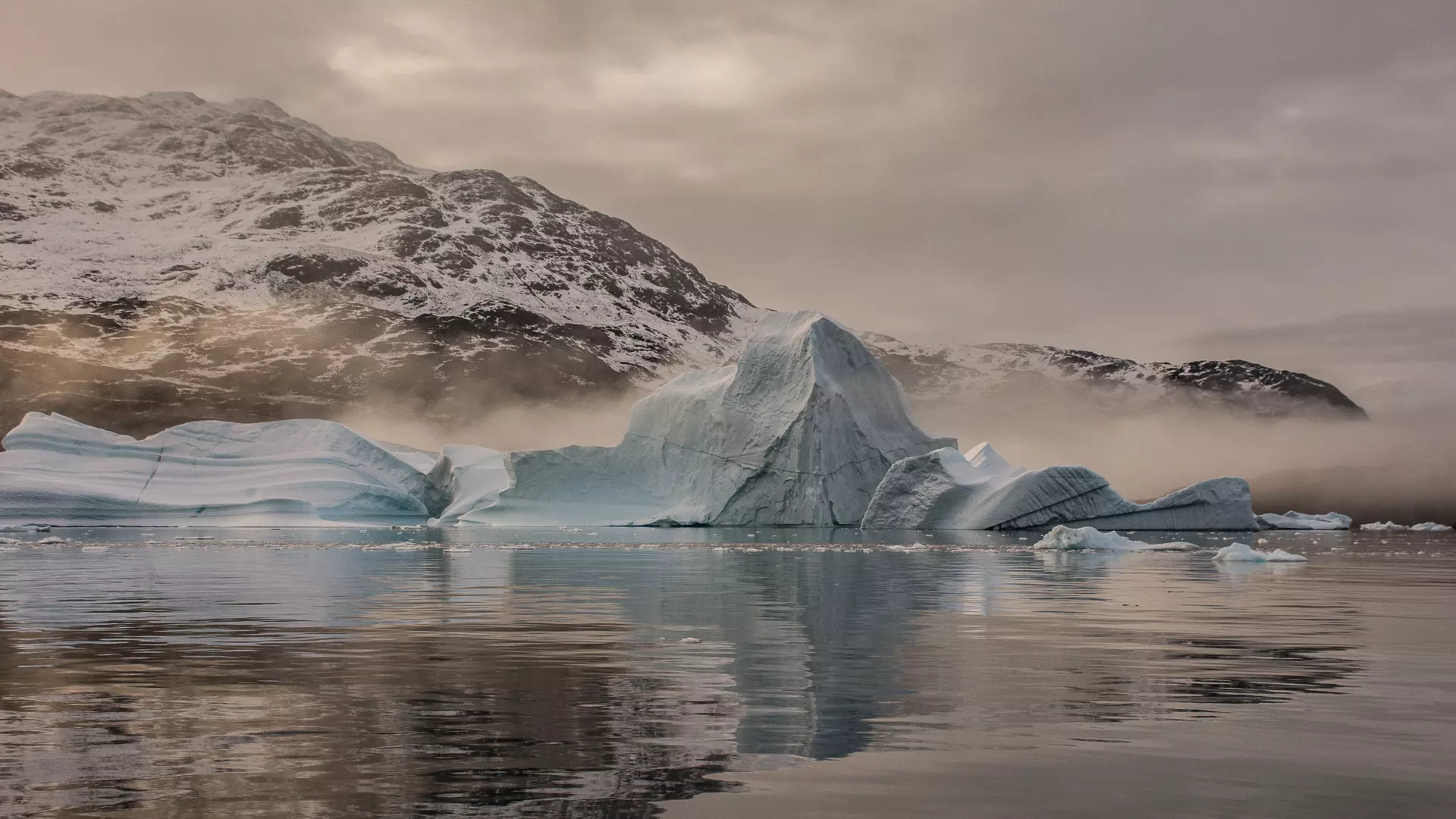 Fantastic iceberg scenery near Røde Ø durig dawn, Scoresby Sun